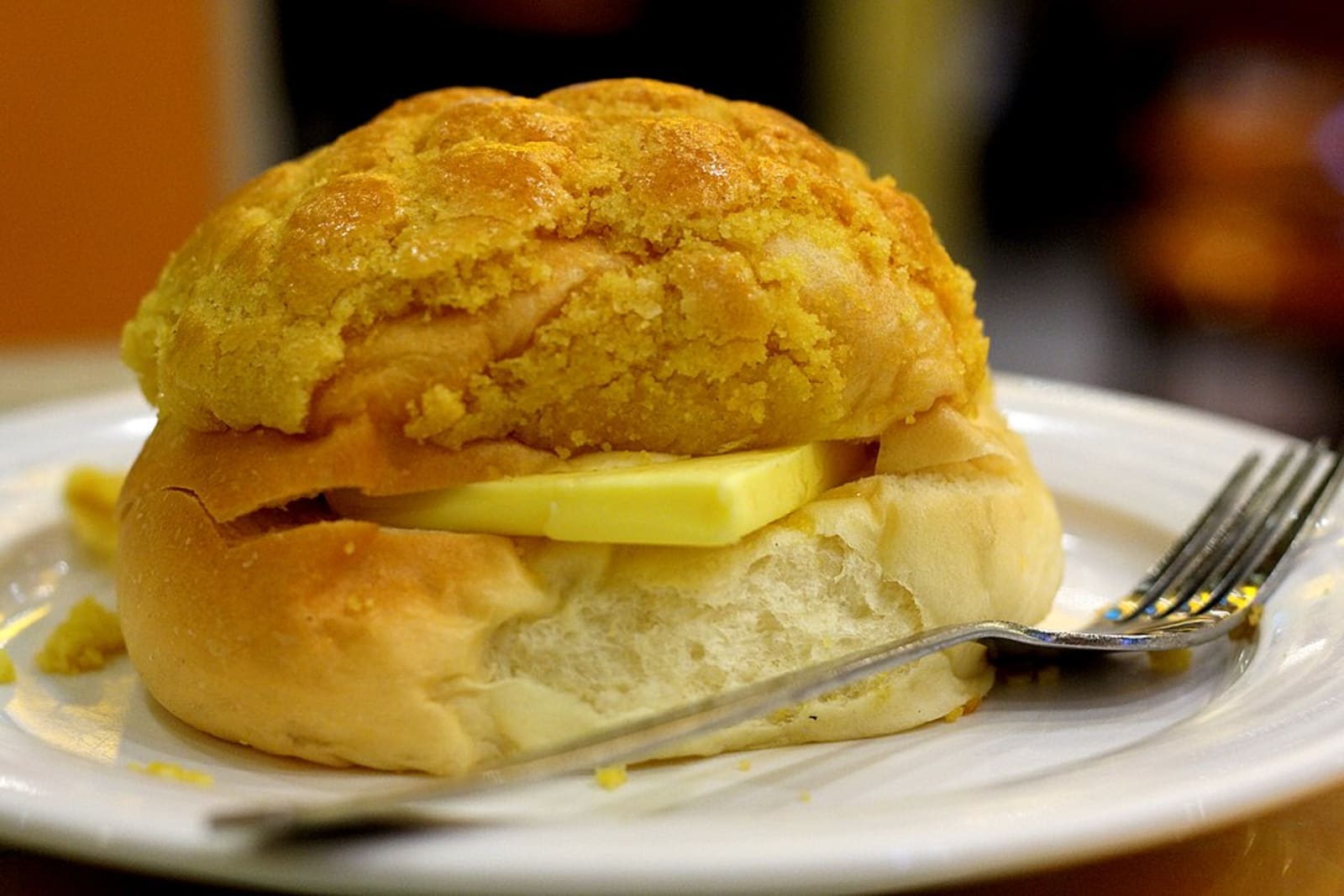Everything You Need to Know about the Pineapple Bun 2 A warm pineapple bun with cold butter.